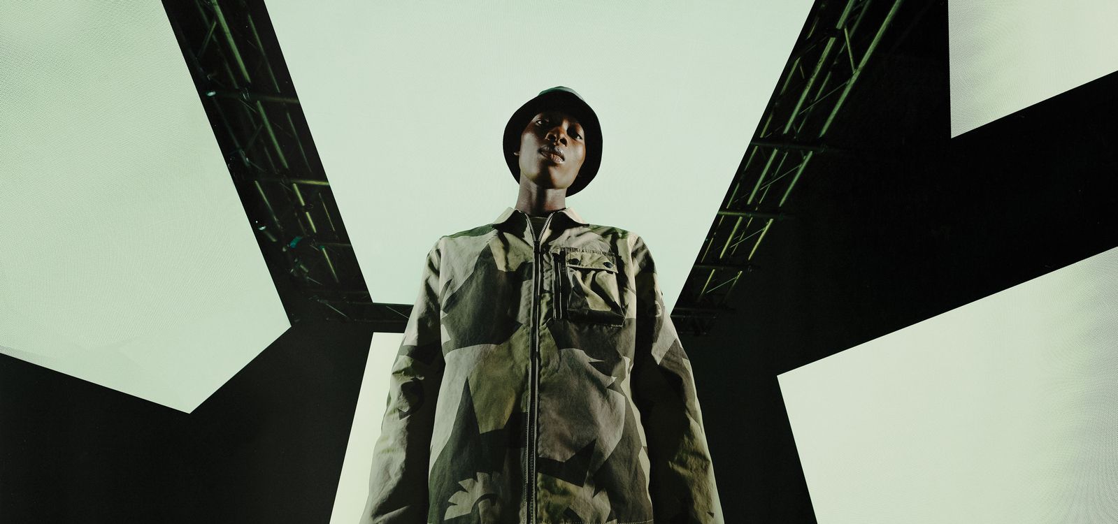 Male model wearing belstaff fragment phoenix rail overshirt in aloe.