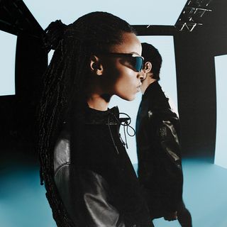 Female Model wearing the Belstaff Heirloom Trialmaster in Black.